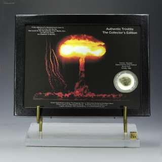 Green and Black Trinitite collectible Oppenheimer quote display, 1.1 g, shown with plexiglass base and sizing cube, for sale at Sciencemall-USA