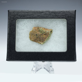 Trinitite specimen ID: 11058, facing front on a display stand, Sciencemall-USA