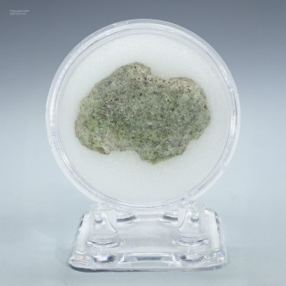 Trinitite specimen ID: 62038 ,4.3 grams, facing front on a display stand, Sciencemall-USA