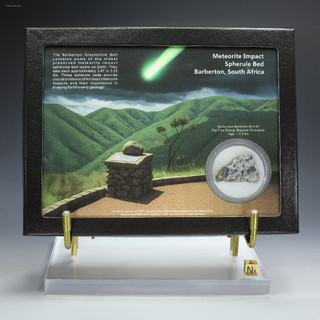 Meteorite impact spherule bed Barberton, South Africa in a Riker box with artwork depicting a bolide - Sciencemall-USA Meteorite impact spherule bed Barberton, South Africa in a Riker box with artwork depicting a bolide - Sciencemall-USA