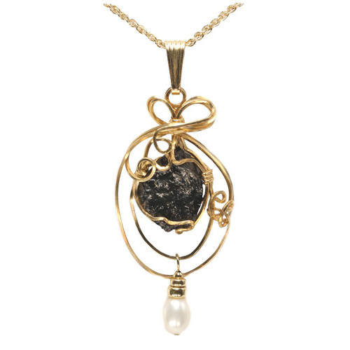 Titanic coal necklace wire wrapped in 14k gold on a chain with a pearl accent.