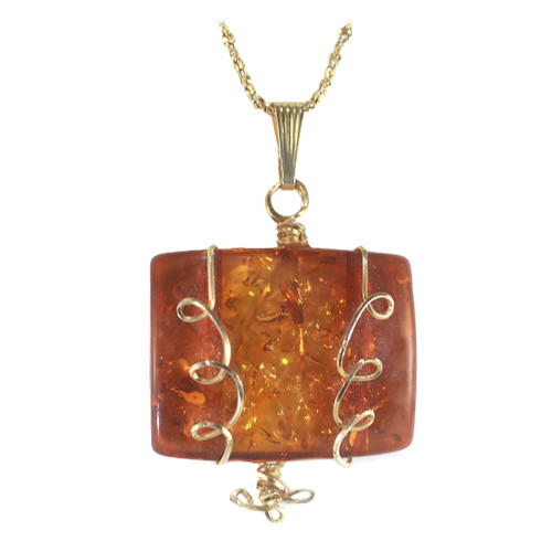 Baltic amber wire wrapped in 14k gold with gold spangles.