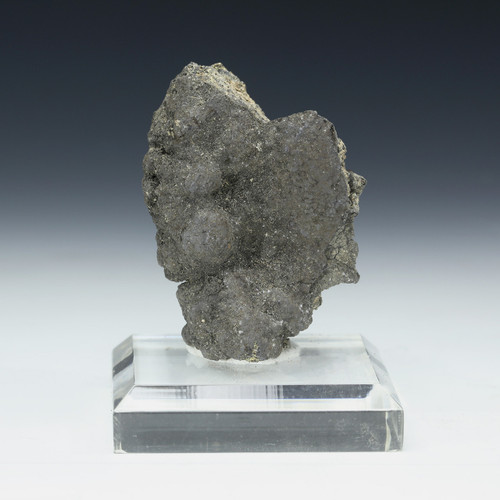 Manganese nodule 44 grams specimen #86205, shown front on a square clear plexiglass riser.