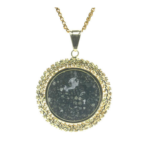 Allende 14k gold chevron coin mount jewelry pendant necklace shown with a gold chain and white background. The "Eye of God" is a Calcium Aluminum Inclusion.