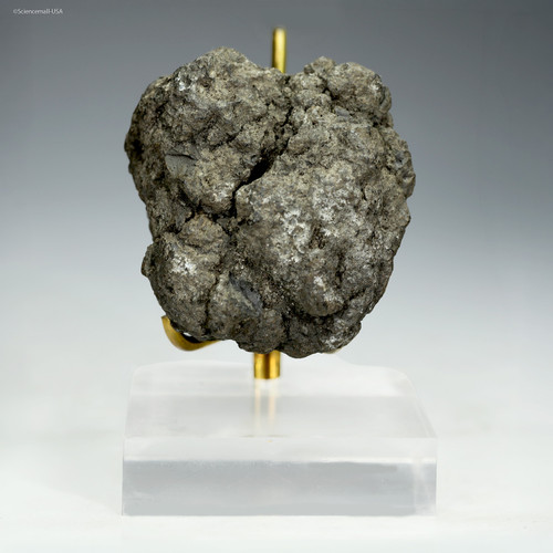 Complete 110g front-facing polymetallic manganese nodule from the Clarion-Clipperton Zone on a display stand, at Sciencemall-USA