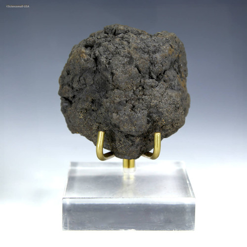 Complete manganese nodule, 129 grams, displayed front-facing on a plexiglass stand, available at Sciencemall-USA.