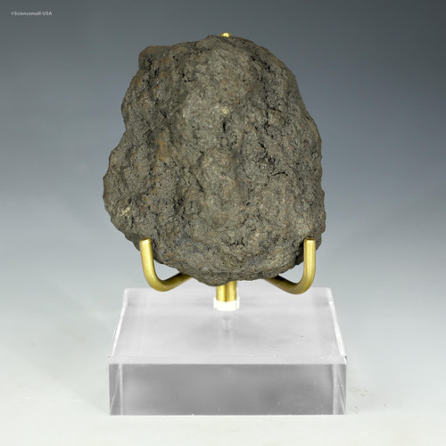Complete manganese nodule, 101 grams, displayed front-facing on a plexiglass stand, for sale at Sciencemall-USA Complete manganese nodule, 101 grams, displayed front-facing on a plexiglass stand, for sale at Sciencemall-USA
