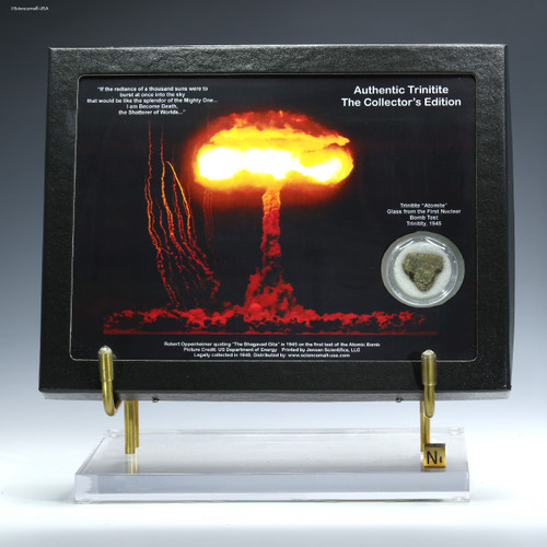 Green Trinitite collectible Oppenheimer quote display, 1.5 g, shown with plexiglass base and sizing cube, for sale at Sciencemall-USA