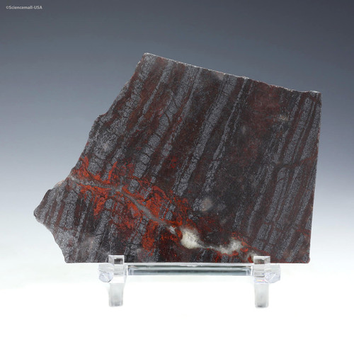 Front-facing, rotated 123-gram Nuvvuagittuq hydrothermal jaspilite on display stand, at Sciencemall-USA Front-facing, rotated 123-gram Nuvvuagittuq hydrothermal jaspilite on display stand, at Sciencemall-USA