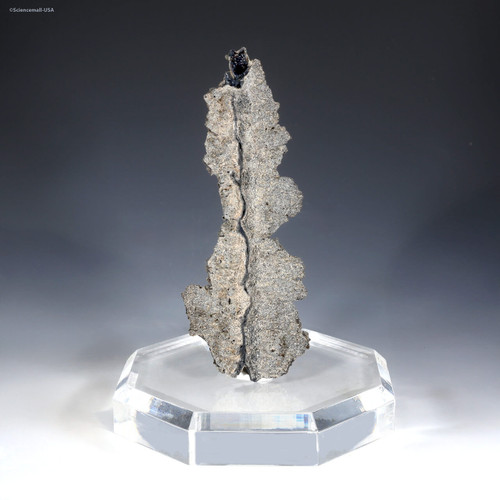 Front-facing fulgurite Thor lightning sand glass on a crystal riser, Sciencemall-USA.