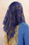 Navy
"Woman wearing a long floral lace Catholic mantilla"