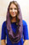 Look at how the soft edges of the plum French Lace Pearl Infinity Veil elegantly frames the face.