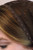 Side view showing the sheer lace and scalloped edge of the Brown petite mantilla veil for girls.