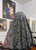 The Marianist Rose in  Black and Silver Catholic Mass Mantilla Veil : The lush, woven rose motif stands out beautifully against the delicate netting, creating a stunning visual texture.