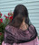 Model wearing the limited edition St. Cecilia Infinity black mantilla veil.
