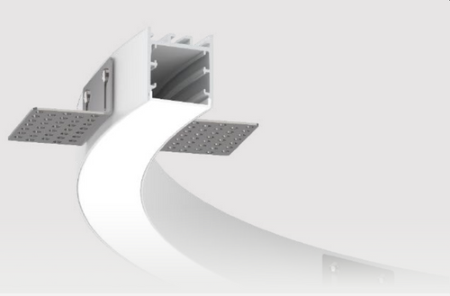 The VT family of luminaires is available in four different widths: 35, 50, 80, and 100 millimeters. They utilize the same product for both surface-mounted and suspended installations, with the addition of an "L" bracket for trimless recessed mounting. These luminaires offer direct lighting options, including high-efficiency LED boards and 24V SMD LED edge-lit solutions. They are designed to deliver fully customized solutions for projects, with a strong emphasis on meeting client needs from conceptualization to completion.