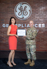 Creating a culture to support those who serve: Jonathan Gocke presents Marcia Brey with Patriot Award 