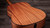 Layered sapele back of the Taylor 117e with ribbon-stripe figure