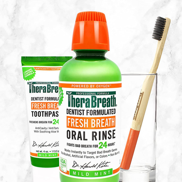 TheraBreath Fresh Breath Dentist Formulated Oral Rinse with a brush