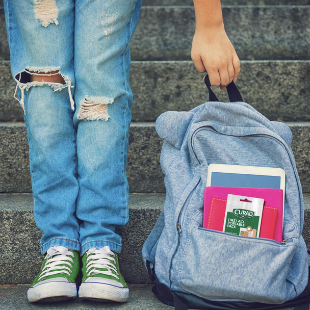 Curad First Aid Portable Pack Ideal for Travel Carry-on Backpacks Water Resistant Pouch Variety Size Bandages Alcohol Swabs 12 Packs