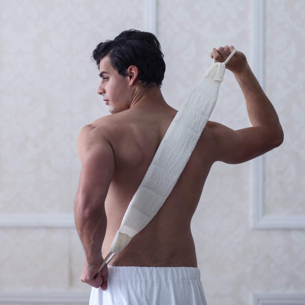 Daily Concepts - Daily Back Scrubber - gently exfoliates the skin with its soft natural organic cotton surface while the soy-based core creates a rich lather