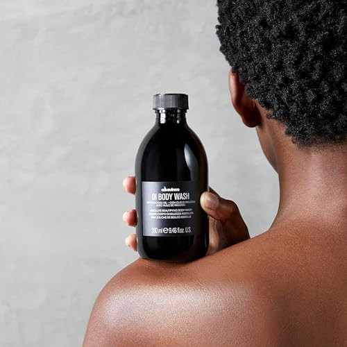 Davines Oi Body Wash Gently Cleansing Moisturizing Body Wash For All Skin Types - Hydrates & Softens Skin With Antioxidant Roucou Oil - Rich Creamy Foam With Signature Oi Scent 9.47 Fl Oz