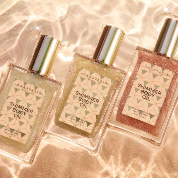 Anastasia Beverly Hills  Shimmer Body Oil Luminous Coconut Scented Glow Ultra-Radiant Body Glow  Silky Non-Greasy Texture Coconut-Vanilla Escape Multidimensional Sparkle Clean & Luxe Artistry Color Gold