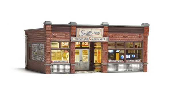 OakridgeStores.com | Woodland Scenics - Smith Brothers TV & Appliance Store - Prebuilt HO Scale Building with Lights (BR5069) 724771050698