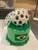 Soccer ball with net cake featuring the Brazilian flag.