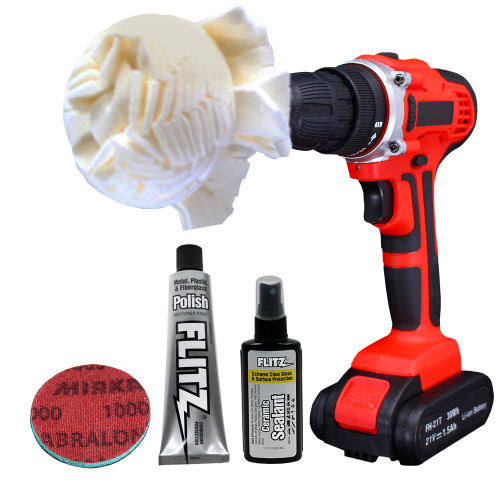 The Flitz Headlight Restoration Kit includes a small tube of Flitz polish paste, a small bottle of Flitz ceramic sealant, a 3” buff ball drill attachment, and a 1000 grit scrubbing pad.