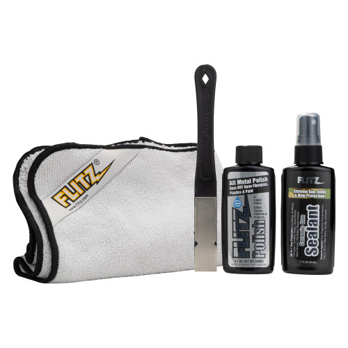 All of the components of the Flitz Knife Restoration kit, including microfiber polishing cloths, a sharpener, a bottle of Flitz Liquid Polish, and a bottle of Flitz Ceramic Sealant