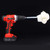 The smallest size of Flitz BuffBall, the Super Mini, is attached to the end of an orange drill and ready to use for buffing and polishing.
