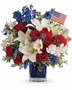 Mix of alostromeria, lilies, carnations and filler in red, white, blue theme. Premium