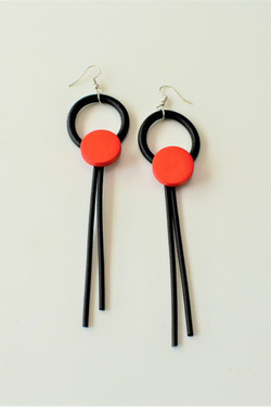 Front of the Neoprene Red Ring Drop Earrings from Laurent Scott