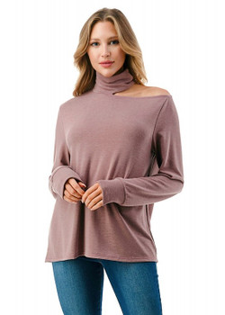 Model wearing the Long Sleeve Cut-Out Top from Ariella USA in the color Dusty Pink