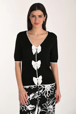 Front of the Reversible Bow Knit Top style 266525 from Frank Lyman in the colors black and off white