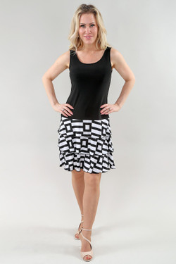 Front of the Pleated Ruffle Hem Dress style 311 from Michael Tyler in the colors black and white