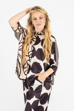 Front of the Hi-Low Multi-Print Blouse style FC261225 from Fashion Concepts in the multi print