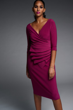 Model showing the front of the Pleated Mid-Length Sheath Dress from Joseph Ribkoff in the color vine