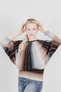 Front of the Monochrome Dolman Sleeve Sweater style FC262239 from Fashion Concepts in the black/multi print
