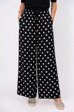 Front of the Dot Print Satin Palazzo Pants style 64072 from Look Mode in the colors black and white
