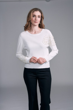 Front of the Pearl Stud Knit Top style BCT8747PRL from Insight in the color winter white