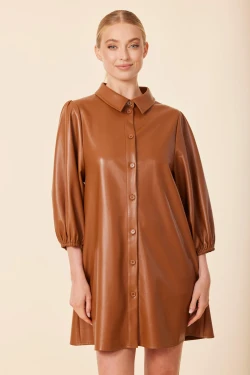 Front of the Vegan Leather Exaggerated Sleeve Tunic Dress style 74996 from Dolce Cabo in the color saddle