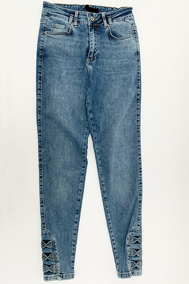 Front of the Bow Detail Skinny Jeans from Michael Tyler in the color blue