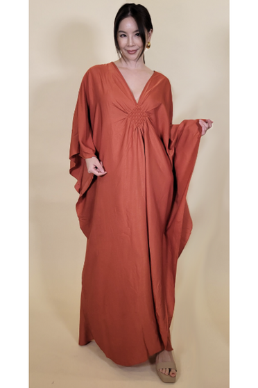 Front of the Diamond Vacay Kaftan Dress from Shawl Dawls in the color rust