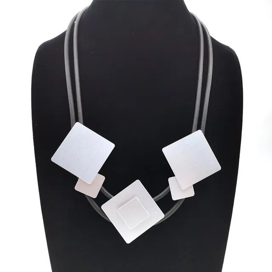 Front of the Neoprene & Aluminum Squares Necklace from Laurent Scott