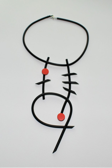Front of the Neoprene Calder Red Necklace from Laurent Scott