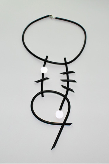 Front of the Neoprene Calder White Necklace from Laurent Scott