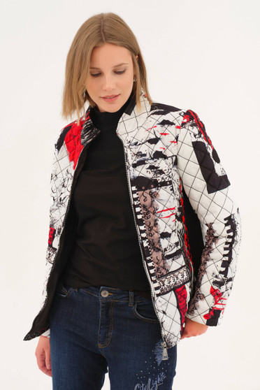 Model wearing the Bookworm Print Quilted Jacket style 75831 from Dolcezza in the multicolor print