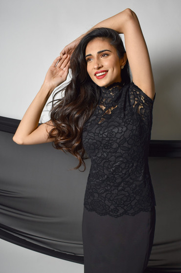 Front of the Lace Mock Neck Top style 219180 from Frank Lyman in the color black
